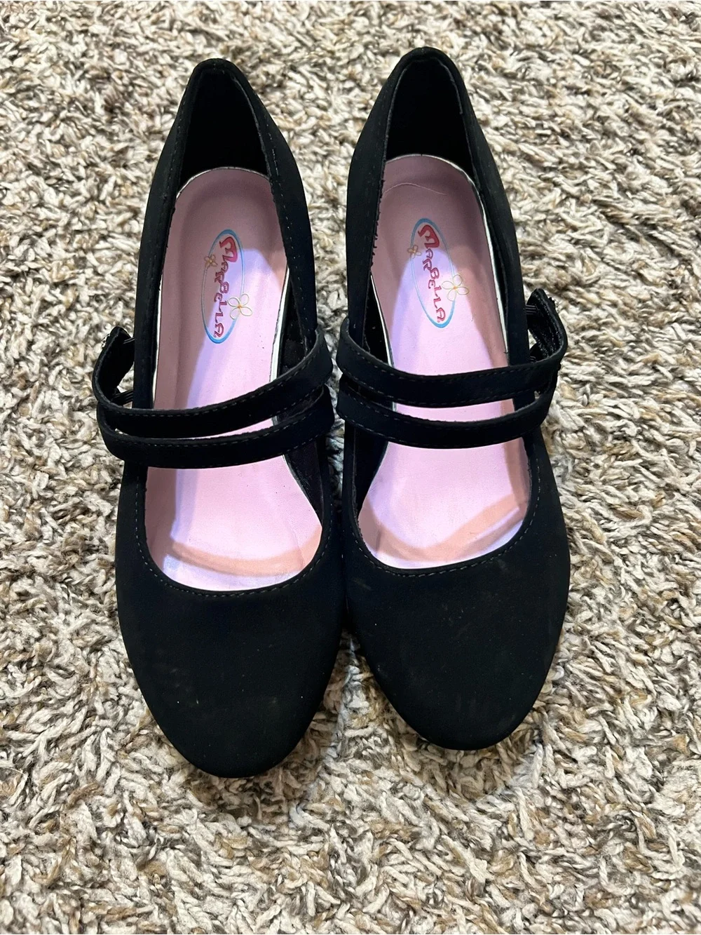 Girl’s black high heel shoes. Size 4